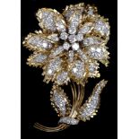 An impressive and fine quality 1950's diamond and 18ct yellow gold and platinum flower brooch/