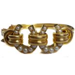 A very fine quality antique natural pearl and 18ct yellow gold bangle, c1888, the modern design