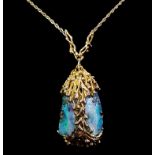 A 1970's yellow gold and boulder black opal pendant hallmarked 1975, the two boulder black opals