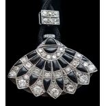 A French Art Deco platinum,diamond and onyx pendant watch, c1925, the palmette design platinum