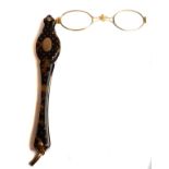 A pair of antique tortoiseshell and gold pique lorgnettes, c1880, with central yellow gold oval