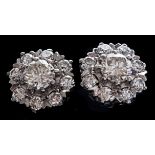 A pair of vintage brilliant cut diamond and 18ct white gold cluster ear studs, c1950, each set to