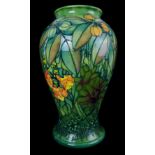 Sally Tuffin for Moorcroft Pottery - A large Rainforest pattern baluster vase, dated 6.4.93,