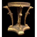 A 19thC gilded bronze comport base, formed of four Griffon heads on 'c' scrolls with paw feet, about