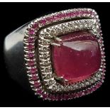 An Italian 750 white gold ring set with rounded rectangular cabouchon rubilite or pink tourmaline