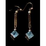 A pair of aquamarine and seed pearl earrings, fish hook wires