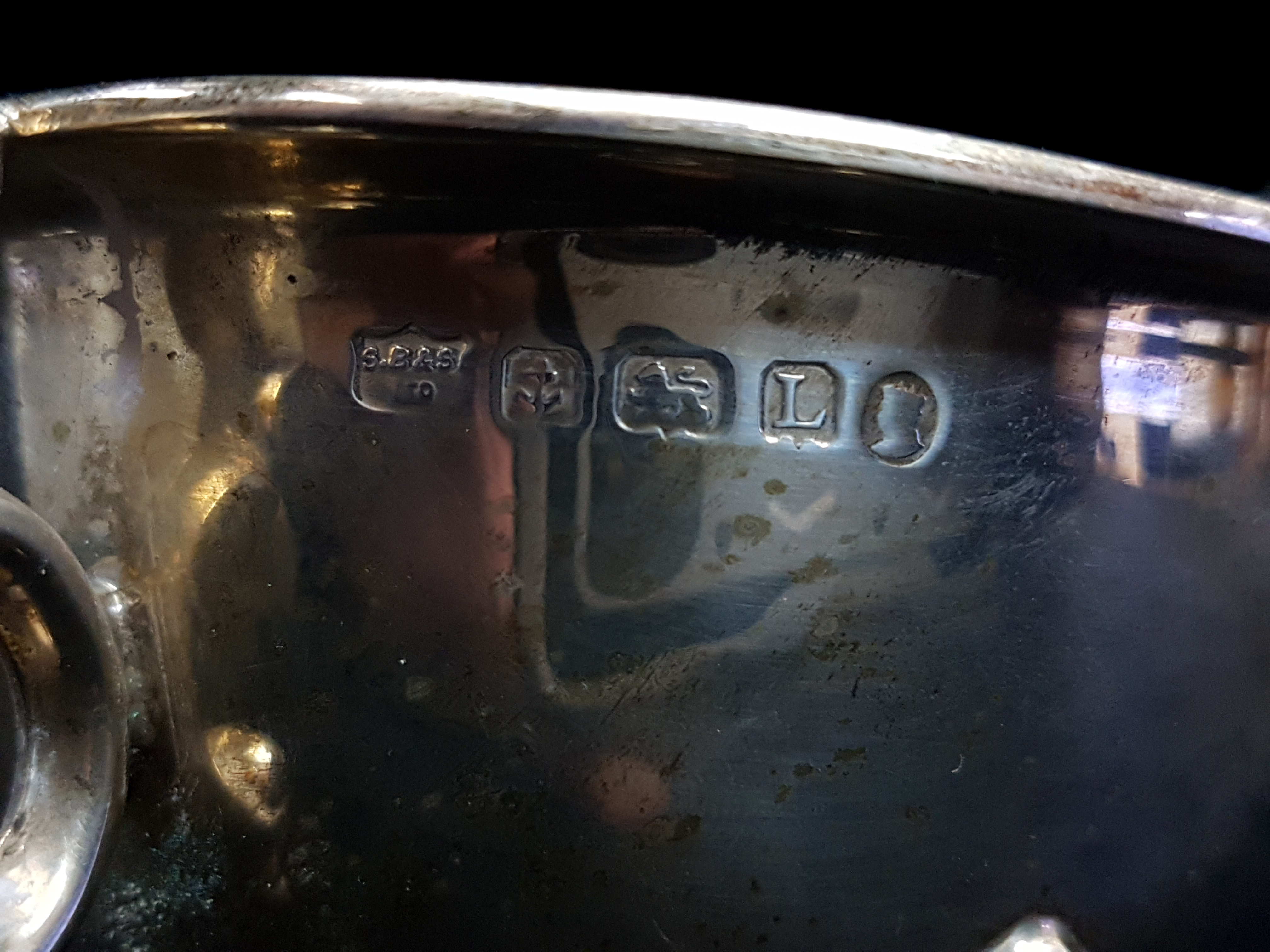 A silver sauceboat, on three volute feet with 'c' scroll handle, Birmingham 1935, kings & queens - Image 3 of 3