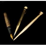 A 9ct gold E Bakers and Sons patent propelling pencil; a 9ct gold swan fountain pen for Todd & Co,