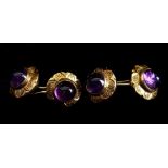 A pair of amethyst and yellow metal cufflinks, each cabouchon stone set as a flower head, the petals