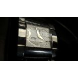 A de Grisogono Geneve gentleman's stainless steel wristwatch, the engine turned rectangular dial