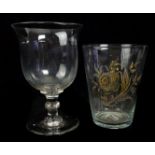 A Continental engraved glass beaker, 18thC, decorated with a rose and foliate picked out in green