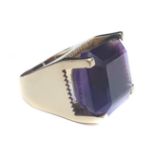 An amethyst and yellow gold dress ring, the base of the setting with scalloped edge, stamped 18k,