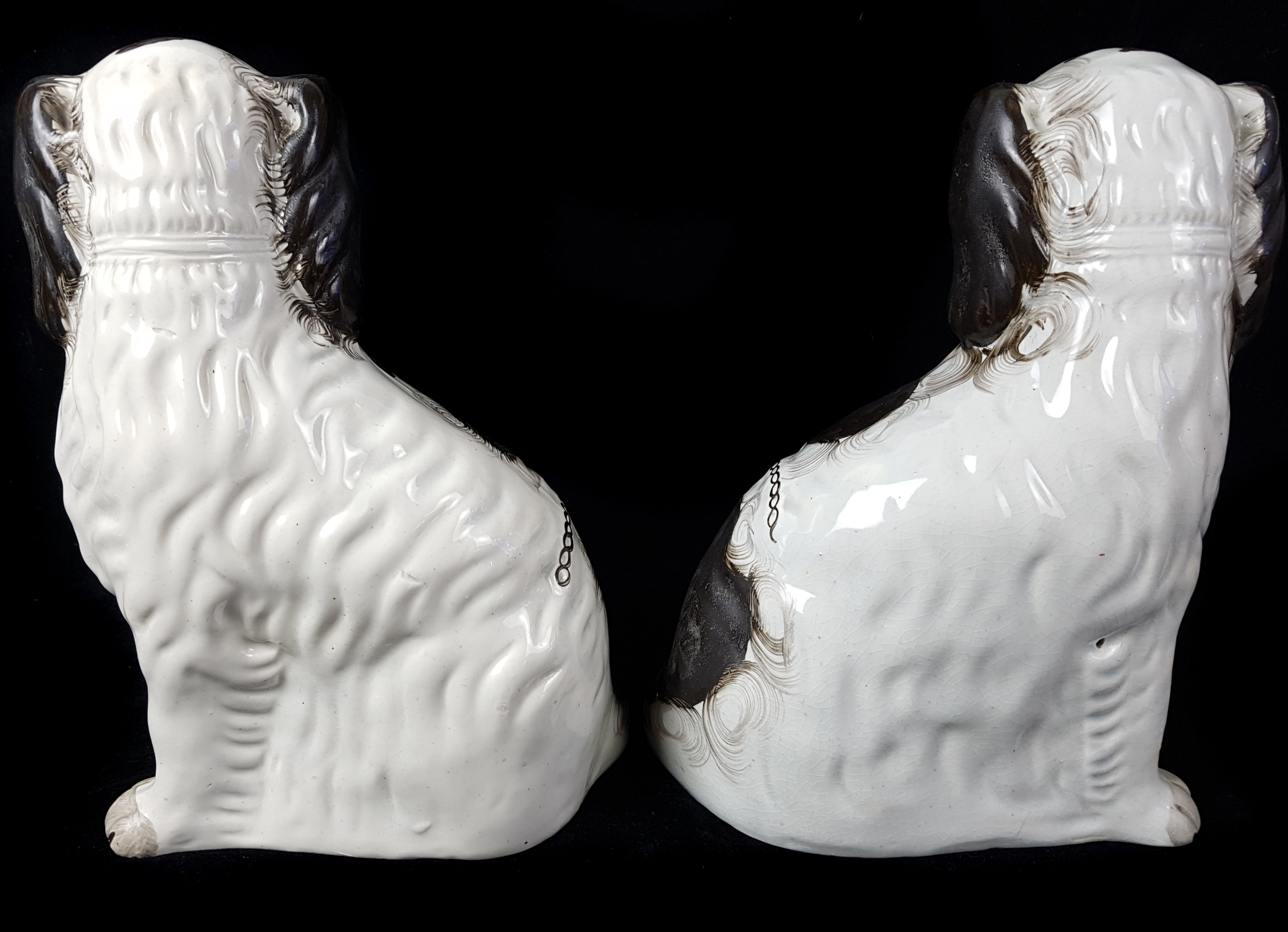 A pair of Staffordshire pottery spaniels, c1860, modelled seated with separate front leg, gilt - Image 5 of 5