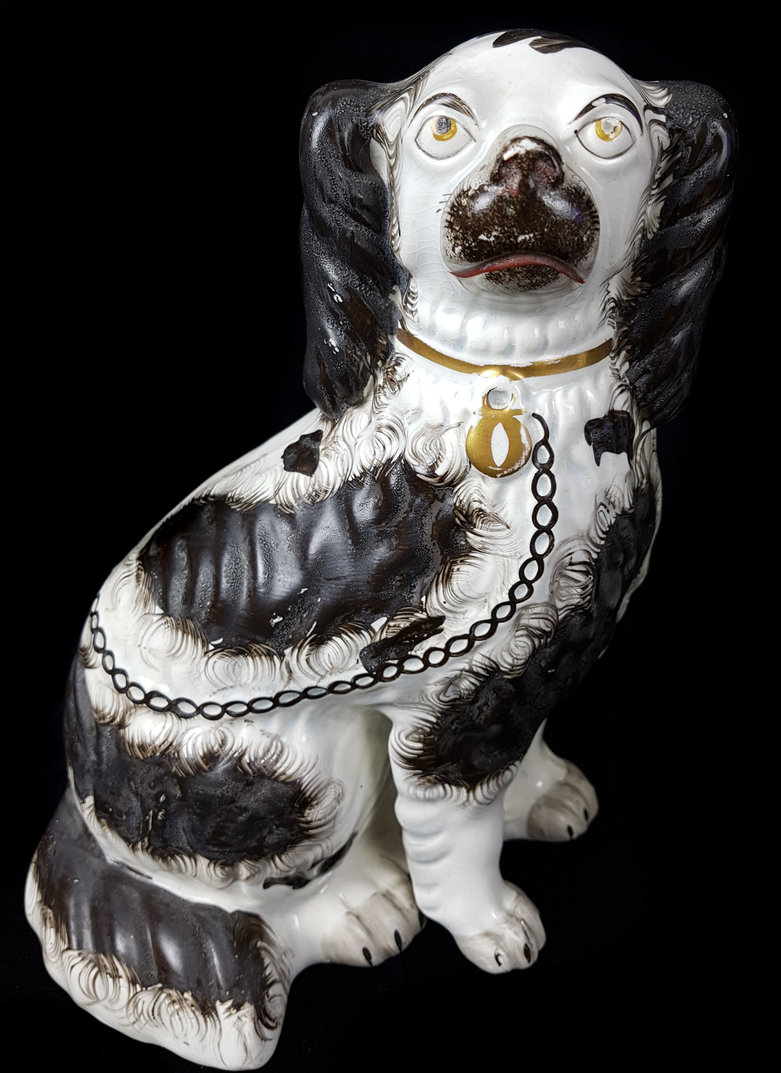 A pair of Staffordshire pottery spaniels, c1860, modelled seated with separate front leg, gilt - Image 2 of 5