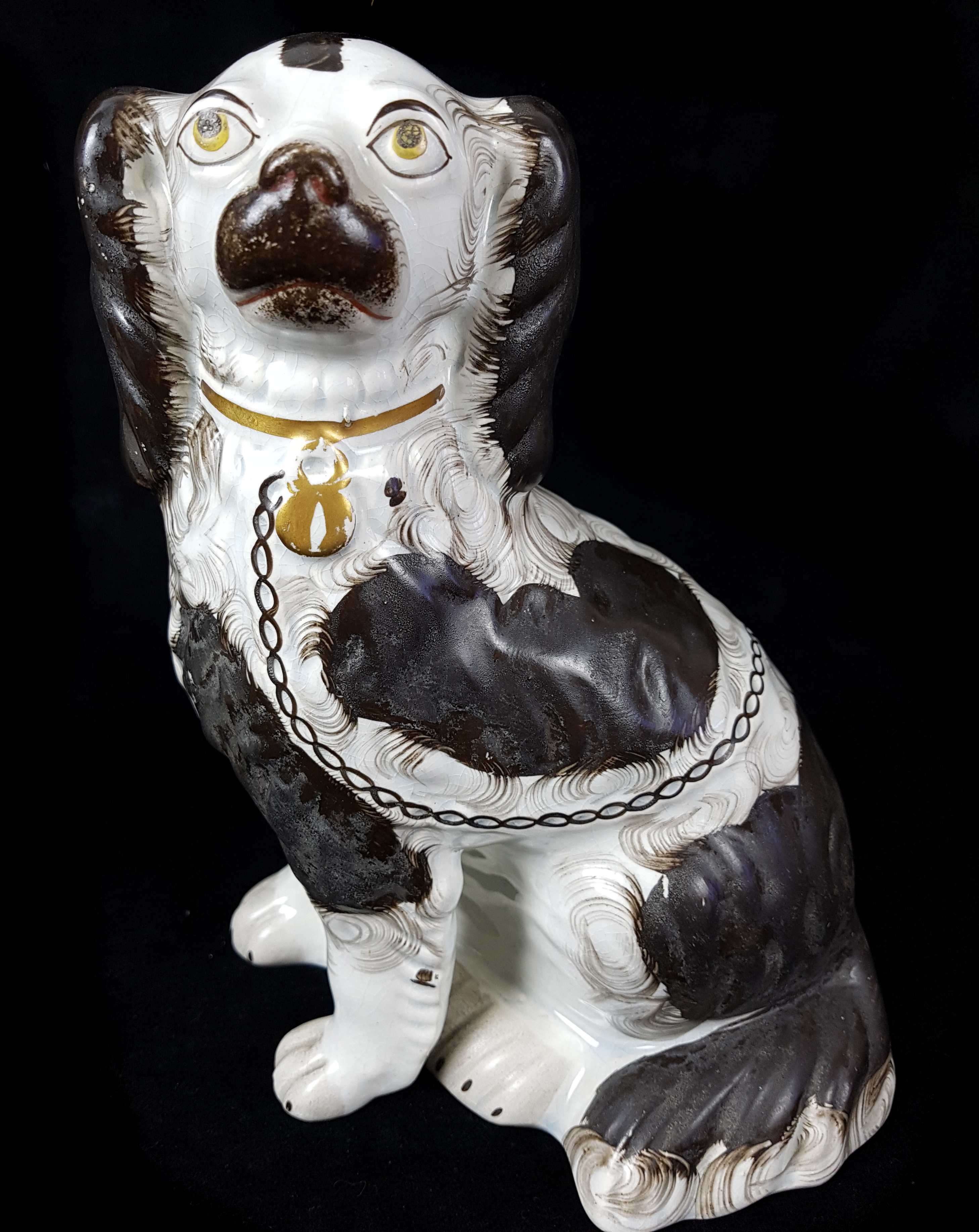 A pair of Staffordshire pottery spaniels, c1860, modelled seated with separate front leg, gilt - Image 3 of 5
