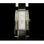 A ladies Gucci wristwatch, rectangular mother of pearl dial, flanked by two rows of round