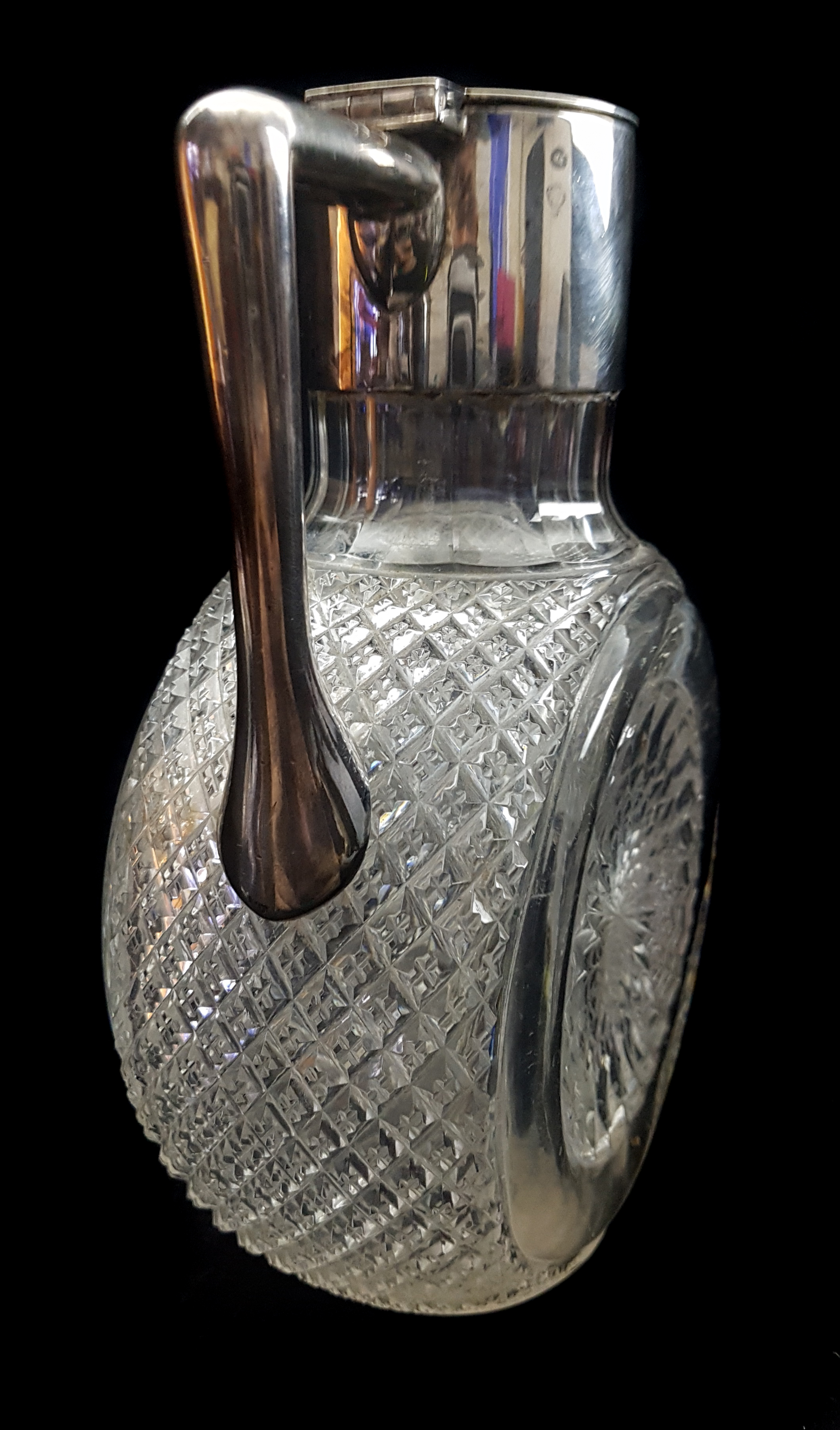 A cut glass silver plated mounted claret jug, circular body with star cut roundel 19cm high - Image 2 of 3
