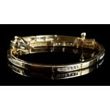 A 9ct yellow gold and diamond bracelet, each bar link slightly curved and alternately of plain and