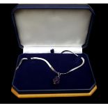 A facetted Blue John semi precious stone pendant, on an English Silver flat link chain, marked