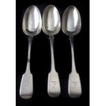 Three crested Irish silver table spoons, Dublin 1870, makers mark, JS in oval for John Smith,