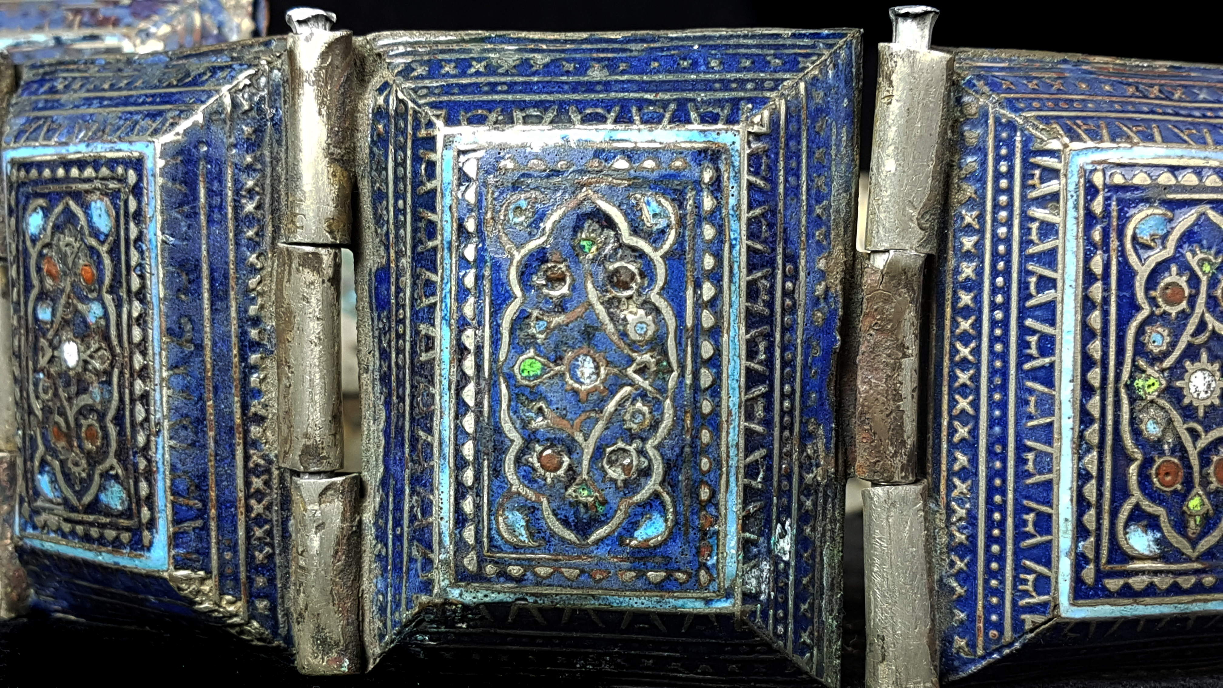 A Middle Eastern enamelled in white metal belt, each link of hollow bevelled rectangular form, - Image 2 of 3