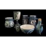 A group of Brixham pottery tea wares, c1970, white swirl design on powder blue ground, and an art
