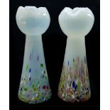 A pair of Bohemian opaline glass crocus bulb vases, with end of day glass inclusions to base, 15.5cm