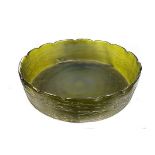 A Kralik glass low bowl, circular, of deep sea green colouration, the exterior with seaweed