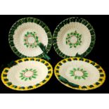 Four creamware ribbon plates marked Waechtersbach, decorated with oak leaves or ivy designs 21cm