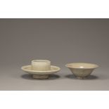 A small Yaozhou celadon conical bowl and a celadon-glazed cup stand