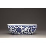 A blue and white 'lotus' shallow bowl