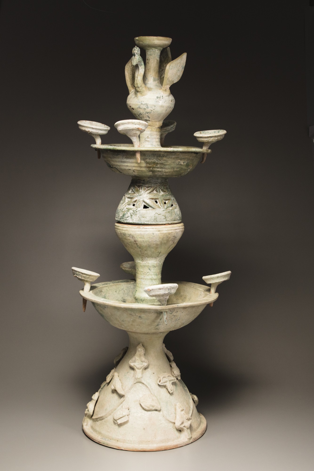 A green-glazed pottery two-tiered oil lamp - Image 4 of 4