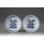 A pair of blue and white soft paste dishes