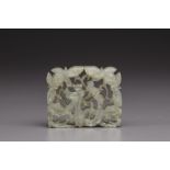 A pale celadon openwork jade plaque