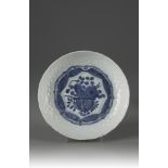 A blue and white and incised-decorated dish