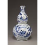 A blue and white double gourd vase