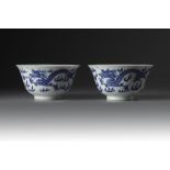 A pair of blue and white 'dragon and phoenix' bowls