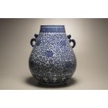 A large blue and white 'lotus' hu vase