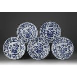 Five blue and white moulded plates