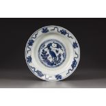 A blue and white 'phoenix' dish