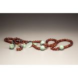 An amber and jadeite court necklace, chaozhu