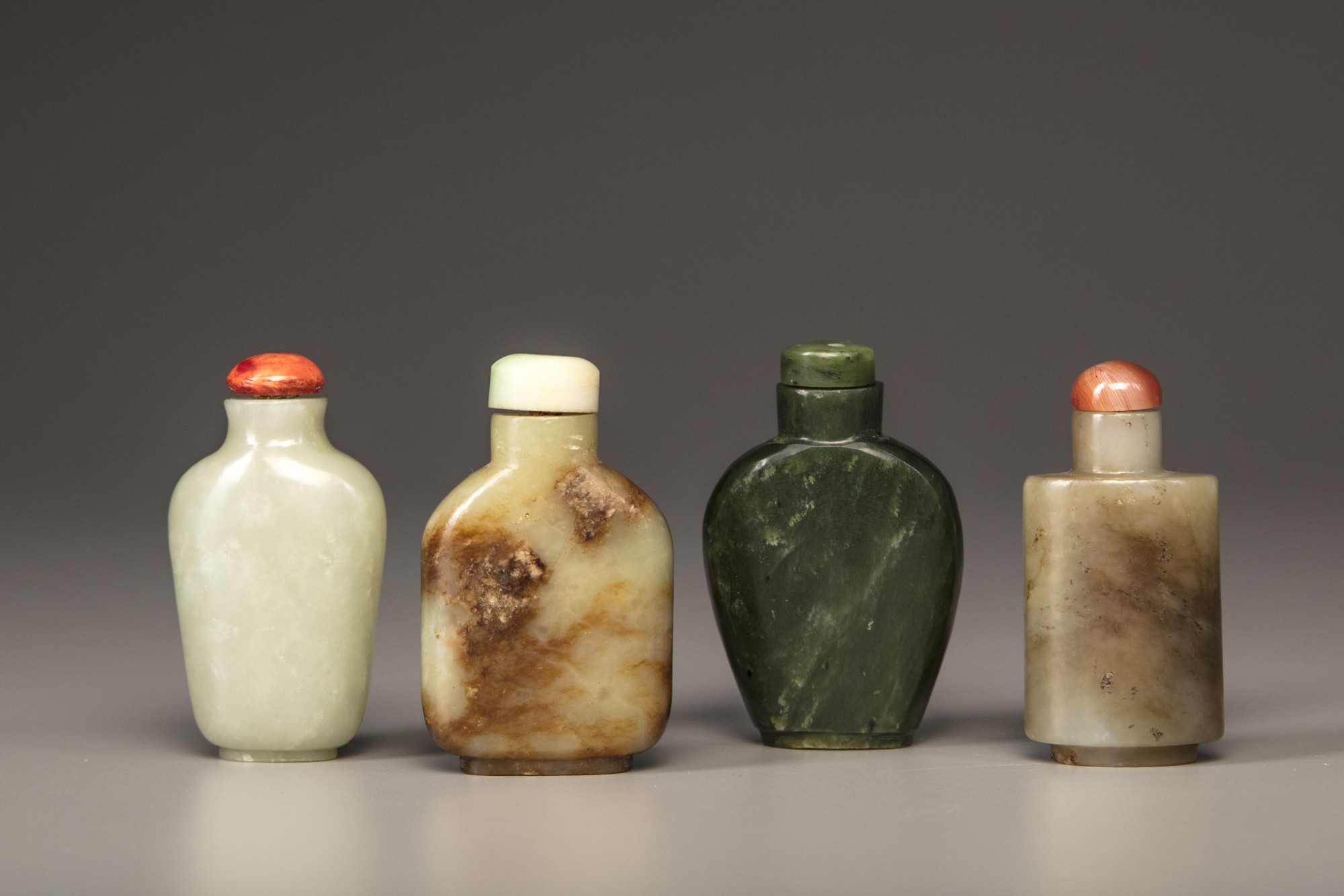 Four Chinese jade snuff bottles