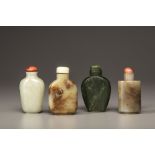 Four Chinese jade snuff bottles