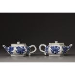 A pair of blue and white hexagonal teapots