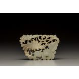 A pale celadon jade 'peony and chrysanthemum' openwork plaque