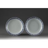 A near pair of blue and white dishes