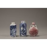 Three porcelain snuff bottles