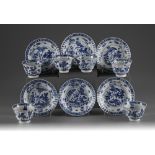 Six sets of blue and white cups and saucers