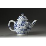 A blue and white moulded 'boys' teapot