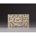 A white jade openwork ‘dragon’ plaque